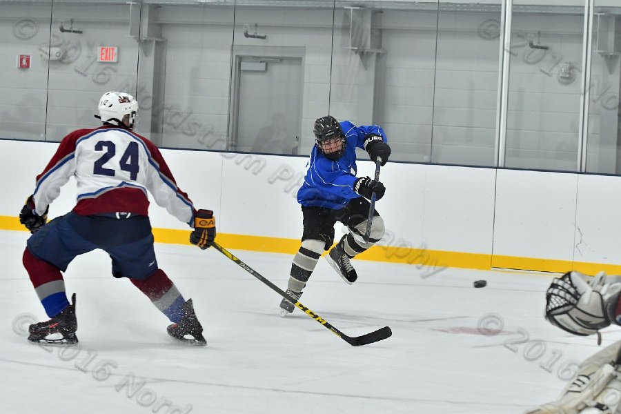Wheaton College Men\'s Ice Hockey vs Middlesex Community College. - Photo By: KEITH NORDSTROM